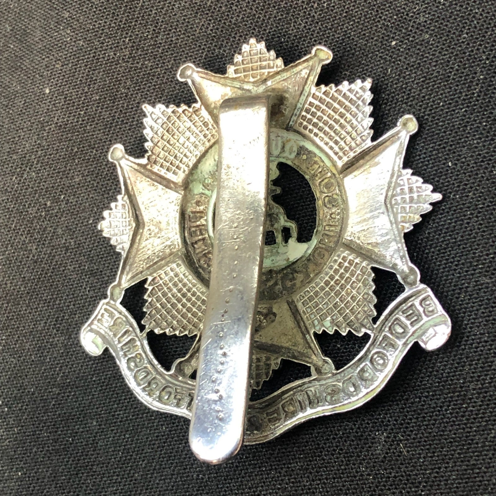 Original WW2 British Army Cap Badge - Bedfordshire and Hertfordshire Regiment - The Militaria Shop