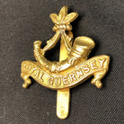 Original British Army WW1 Royal Guernsey Light Infantry Cap Badge - The Militaria Shop