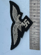 Reproduction WW2 German Luftwaffe Officer's Bullion Breast Eagle on a black background - The Militaria Shop