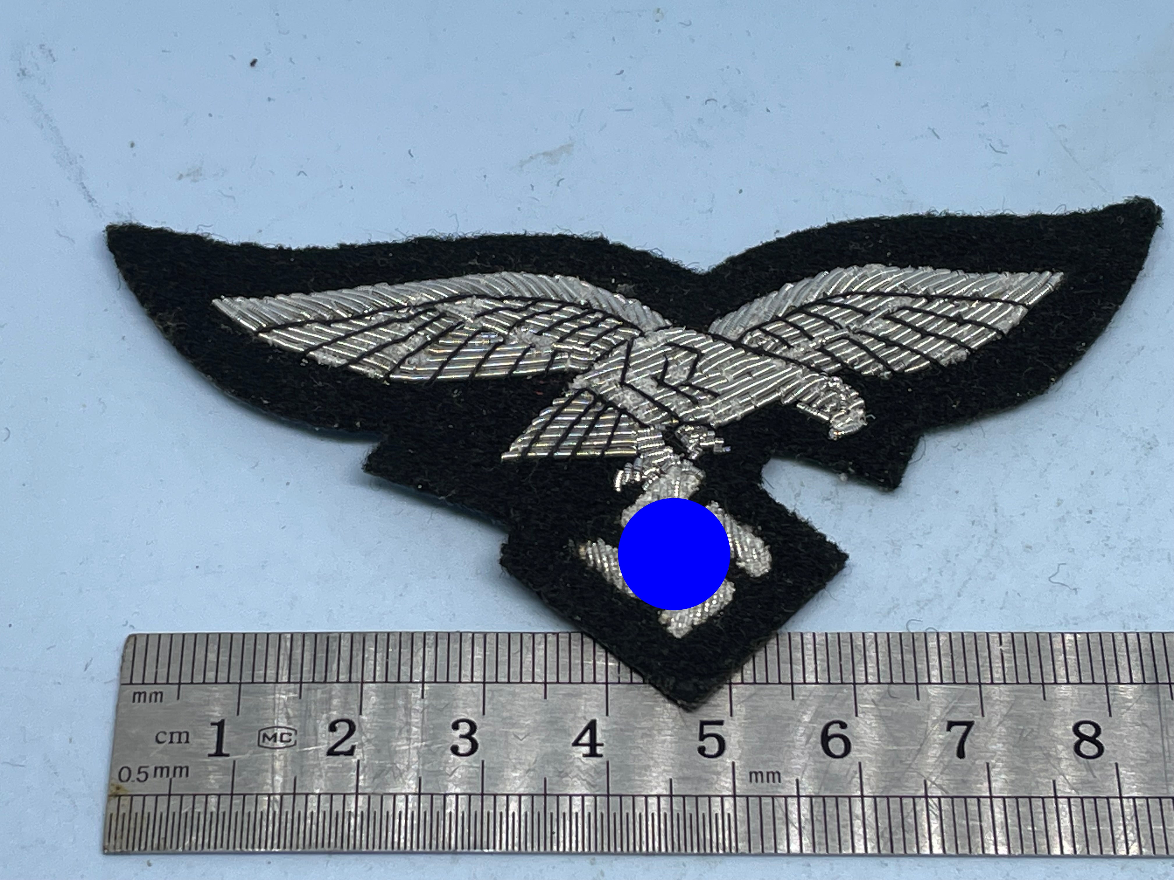 Reproduction WW2 German Luftwaffe Officer's Bullion Breast Eagle on a black background - The Militaria Shop