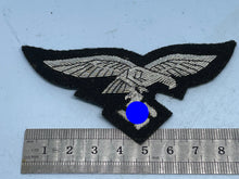 Load image into Gallery viewer, Reproduction WW2 German Luftwaffe Officer's Bullion Breast Eagle on a black background - The Militaria Shop
