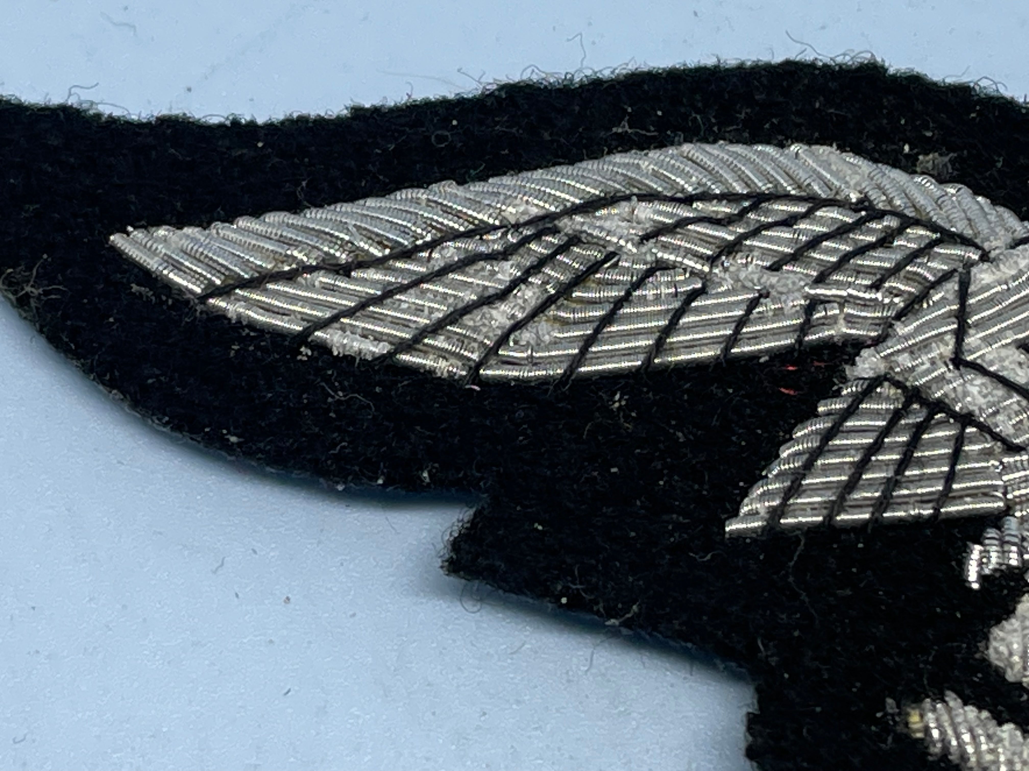 Reproduction WW2 German Luftwaffe Officer's Bullion Breast Eagle on a black background - The Militaria Shop