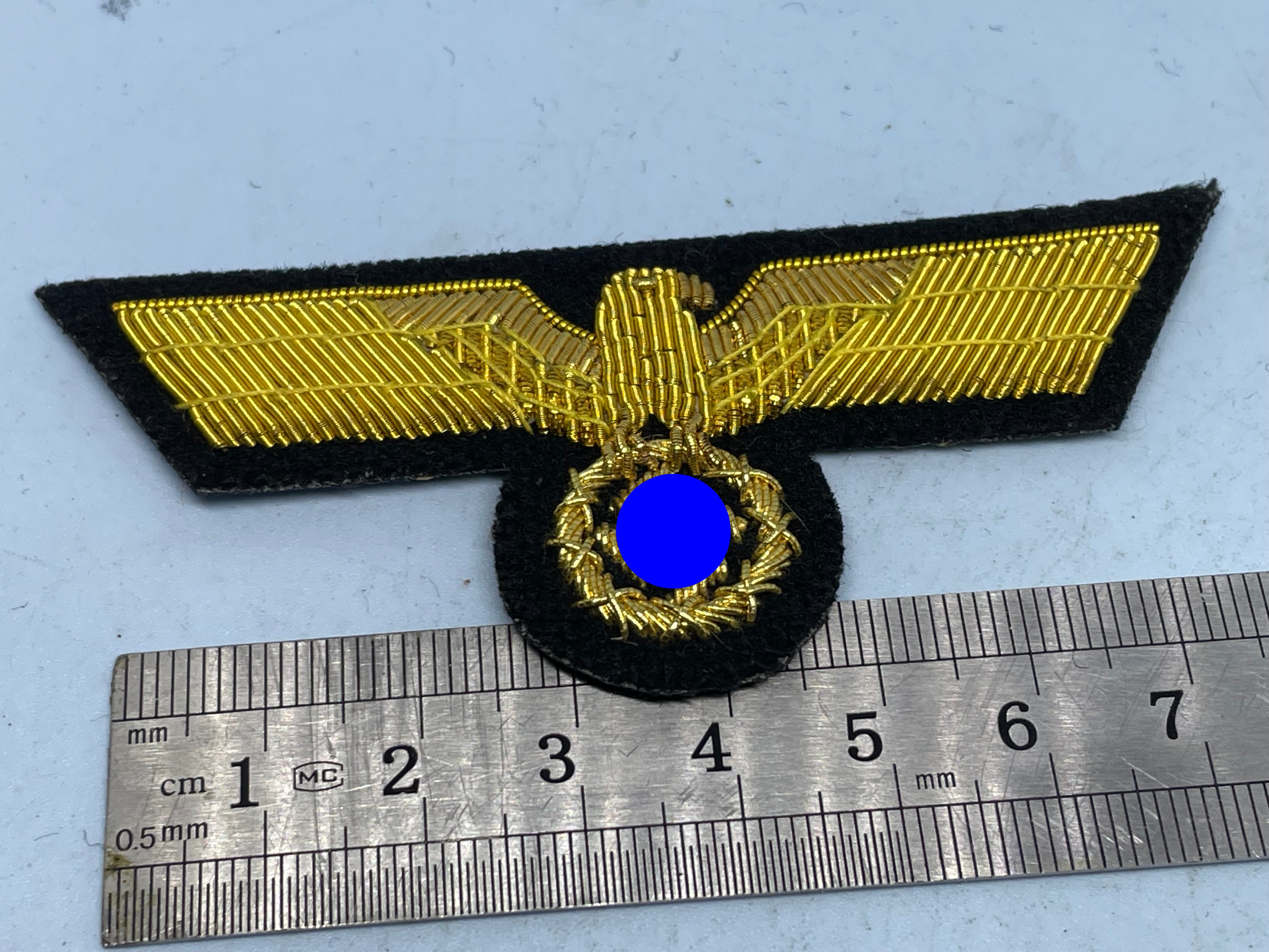 Reproduction WW2 German Kriegsmarine Officer's Bullion Breast Eagle on a black background - The Militaria Shop