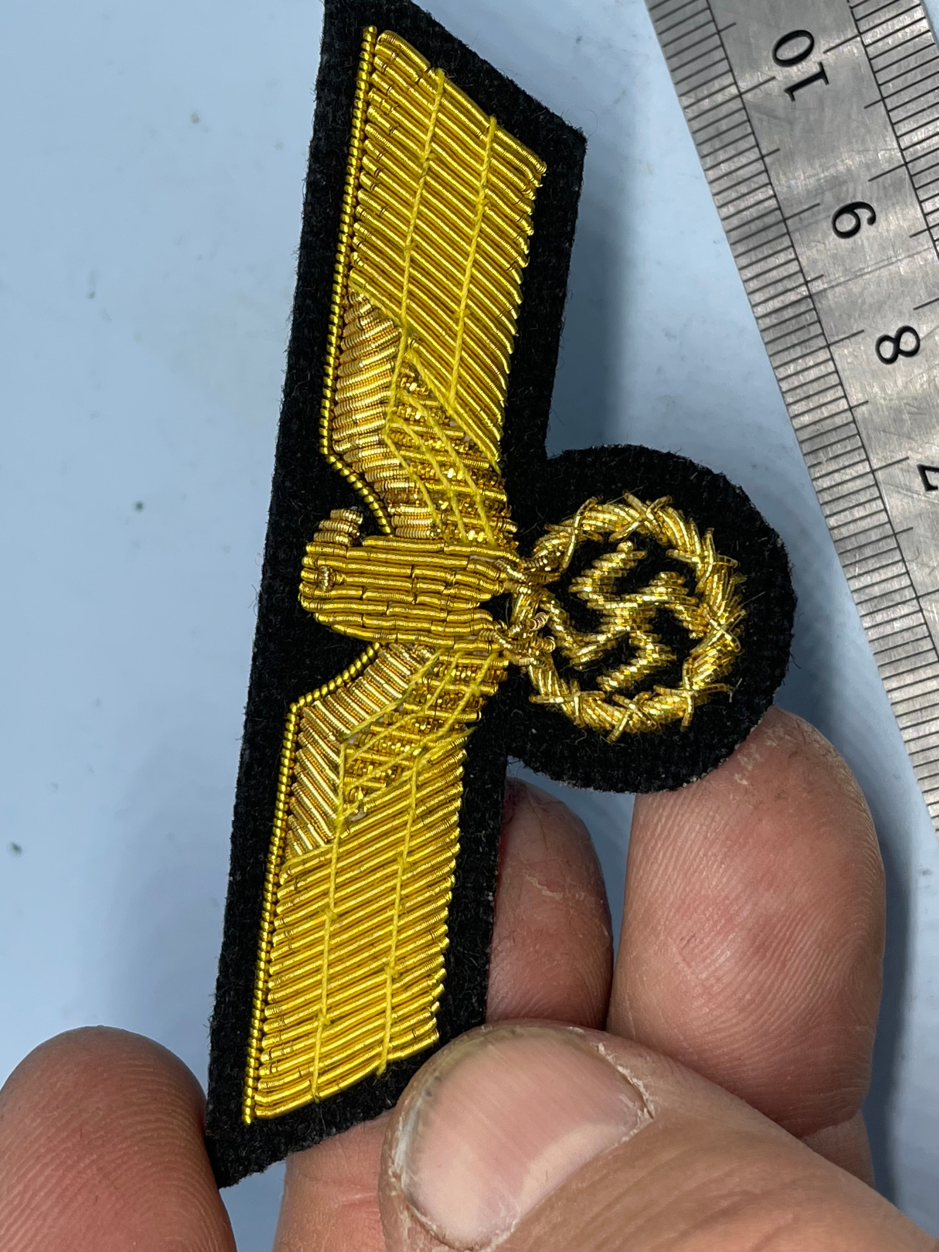 Reproduction WW2 German Kriegsmarine Officer's Bullion Breast Eagle on a black background - The Militaria Shop