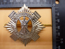 Load image into Gallery viewer, WW1 / WW2 British Army Cap Badge -  6th Volunteer Battalion - The Royal Scots - The Militaria Shop
