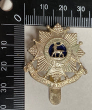 Load image into Gallery viewer, A white metal British Army Bedfordshire &amp; Hertfordshire Regiment cap badge.
