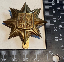 Load image into Gallery viewer, WW1 / WW2 British Army 13th Kensington Battalion Brass Cap Badge with Slider.
