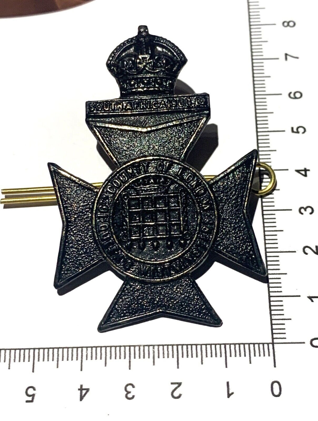 WW1 British Army 16th COUNTY OF LONDON - ORIGINAL blackened Cap Badge.