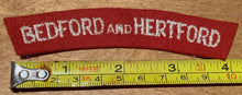 Load image into Gallery viewer, WW2 British Army Bedford and Hertford Regiment cloth shoulder title.
