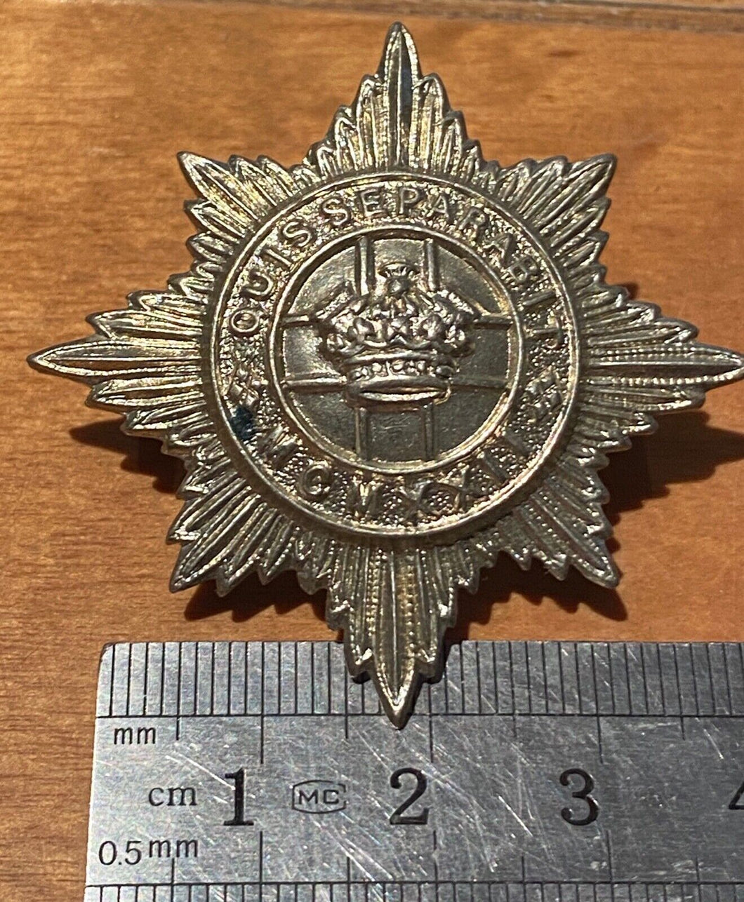British Army Kings Crown - white metal 4th/7th Royal Dragoon Guards cap badge
