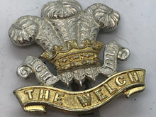 Load image into Gallery viewer, A silver &amp; gilt washed THE WELSH Regiment dress cap badge with slider --- B10
