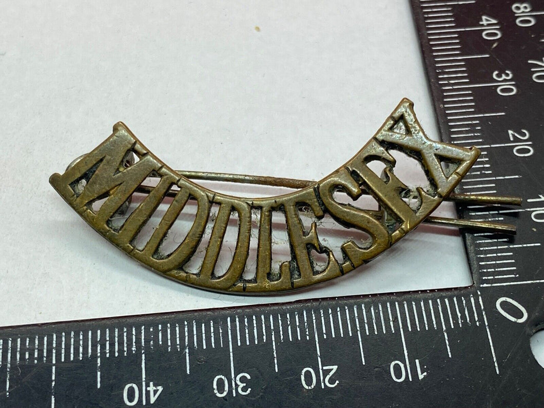 Original British Army WW1 MIDDLESEX Regiment Brass Shoulder Title
