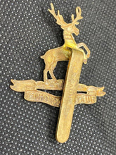 Load image into Gallery viewer, Original British Army WW1 HUNTINGDONSHIRE REGIMENT Cap Badge
