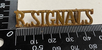 A WW1 British Army Royal Signals brass shoulder title. - The Militaria Shop