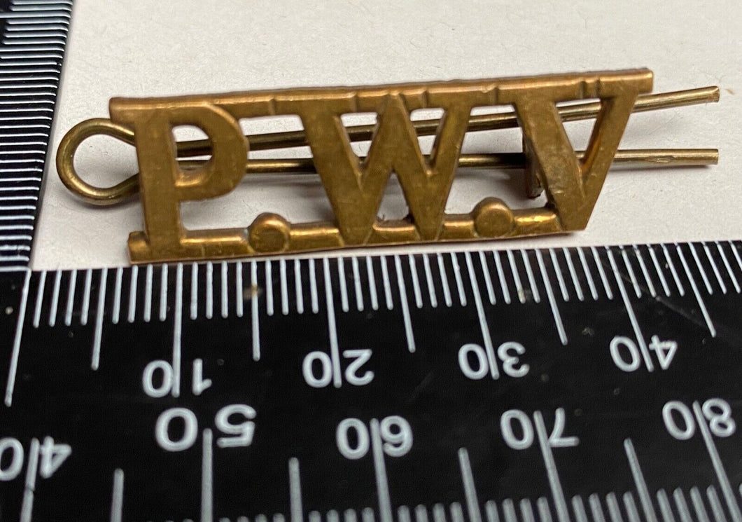 A WW1 British Army Prince of Wales Volunteer Regiment brass shoulder title.
