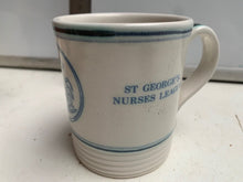 Load image into Gallery viewer, Vintage British Saint George&#39;s Nurses League Coffee Mug - Cracked
