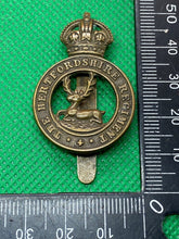 Load image into Gallery viewer, Original British Army WW1 / WW2 The Hertfordshire Regiment Cap Badge - The Militaria Shop
