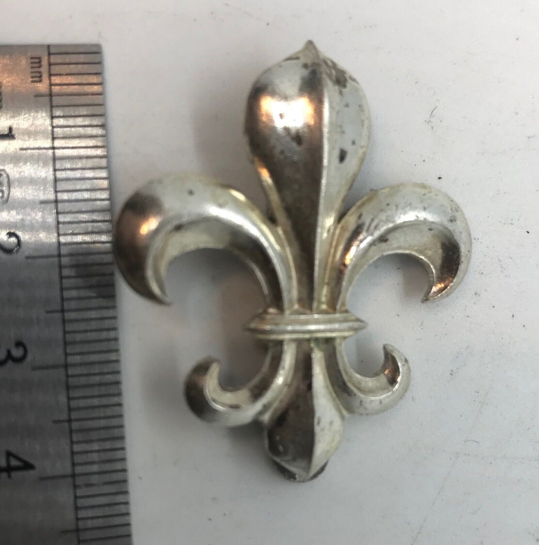 A silver washed officers dress cap badge for the Manchester Regiment  -----  B31