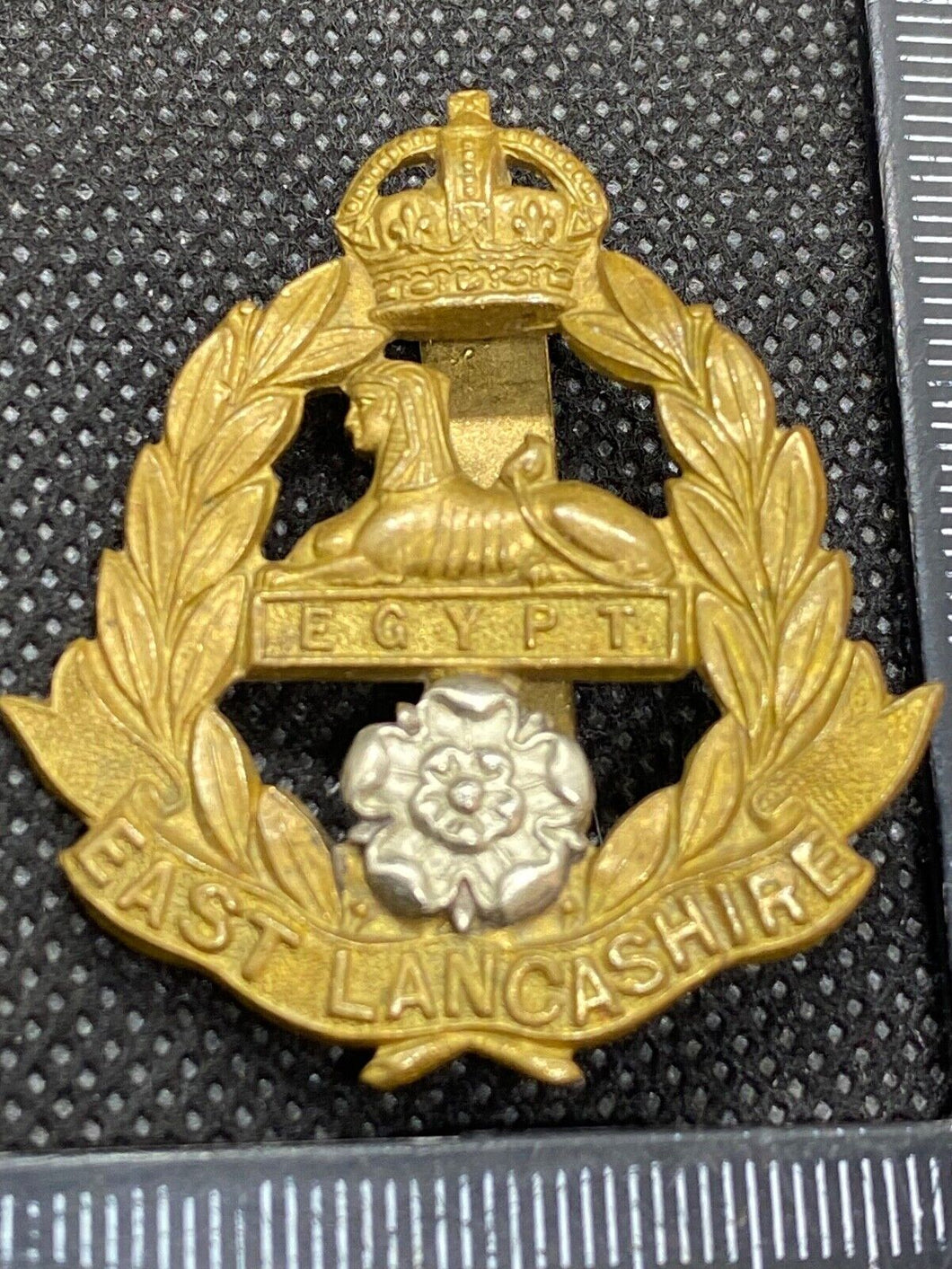 Original British Army East Lancashire Regiment Cap Badge