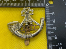 Load image into Gallery viewer, WW1 / WW2 British Army THE KINGS SHROPSHIRE LIGHT INFANTRY Brass &amp; WM Cap Badge.
