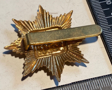 Load image into Gallery viewer, WW1 / WW2 British Army 13th Kensington Battalion Brass Cap Badge with Slider.
