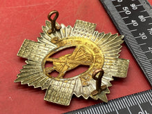 Load image into Gallery viewer, A WW2 British Army - The Royal Scots White Metal and Brass Cap Badge.
