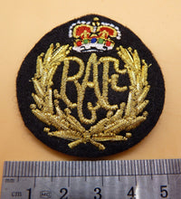 Load image into Gallery viewer, RAF QC - Royal Air Force current issue padded cap badge. Brand new and unissued.
