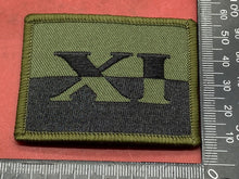 Lade das Bild in den Galerie-Viewer, British Army Current Issue Gurkha Regiment XI Camouflaged Shoulder Badge.
