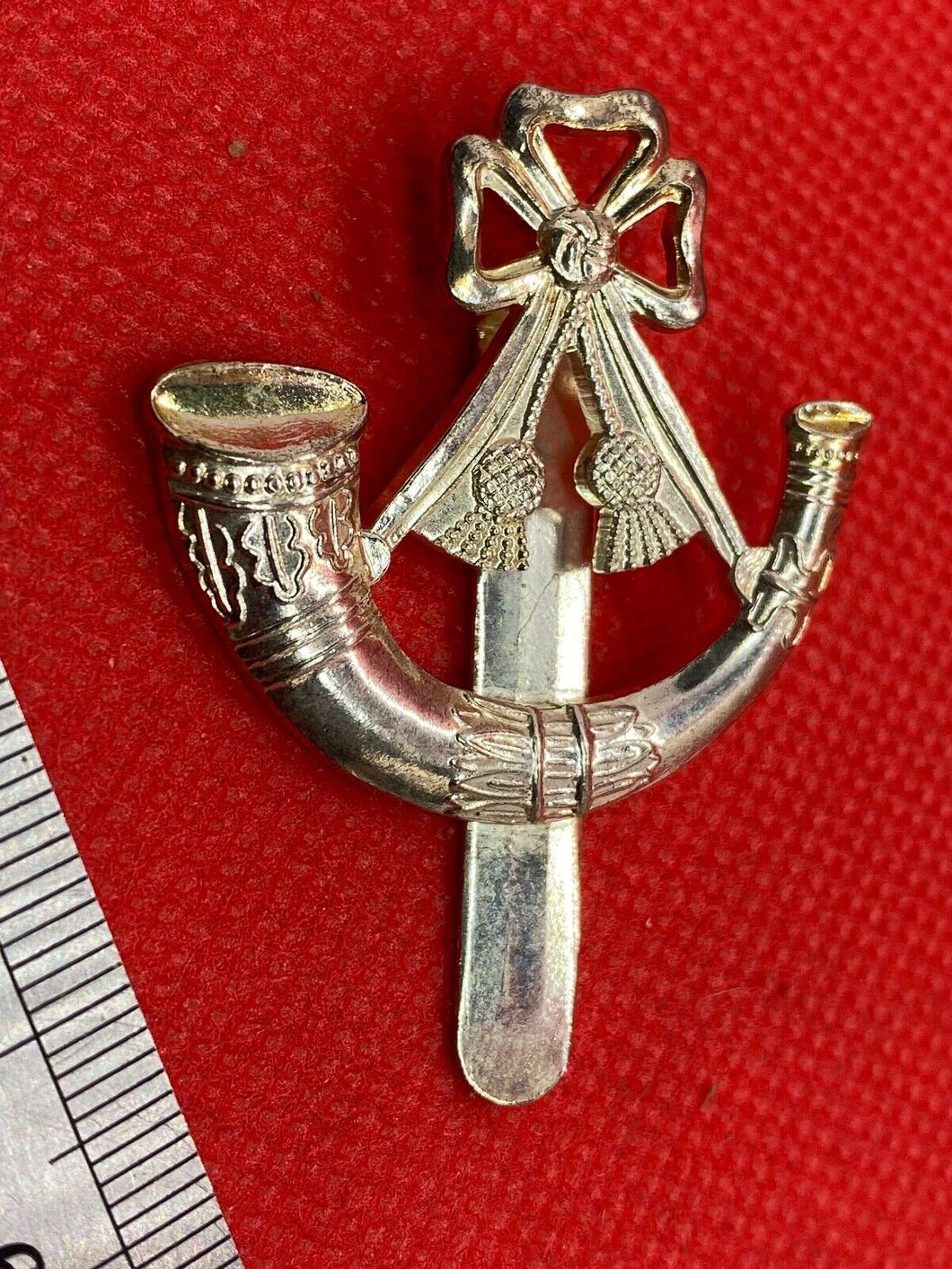 Original British Army Light Infantry Anodised (Staybrite) Cap Badge