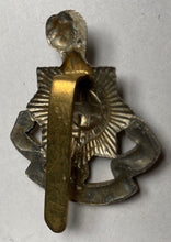 Load image into Gallery viewer, WW1 / WW2 British Army Royal Sussex Regiment white metal and brass cap badge.
