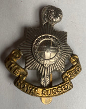 Load image into Gallery viewer, WW1 / WW2 British Army Royal Sussex Regiment white metal and brass cap badge.
