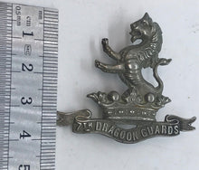 Load image into Gallery viewer, A clean British Army 7th Dragoon Guards white metal cap badge with slider - B31
