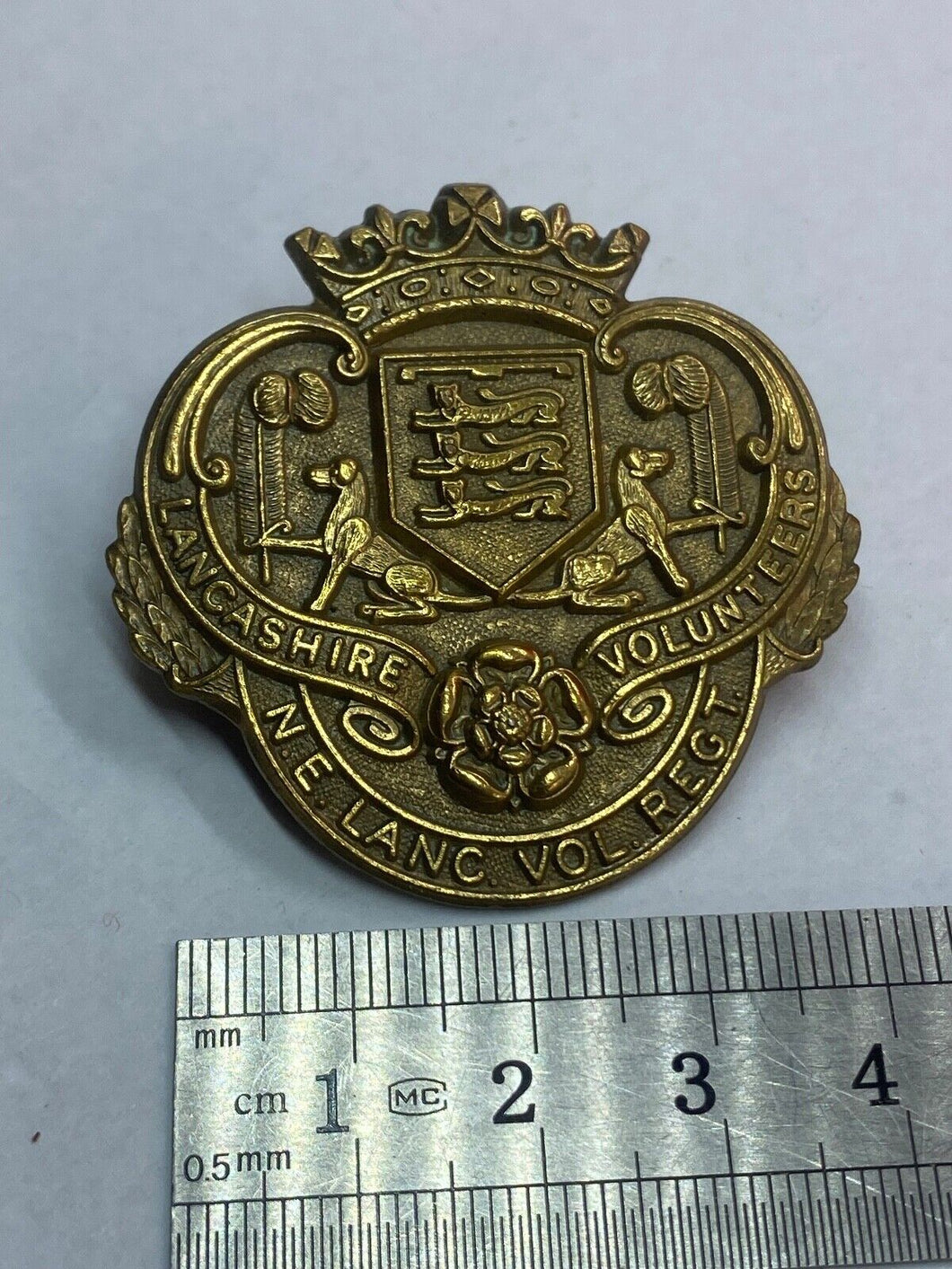 Original British Army - North East Lancashire Volunteer Regiment Cap Badge