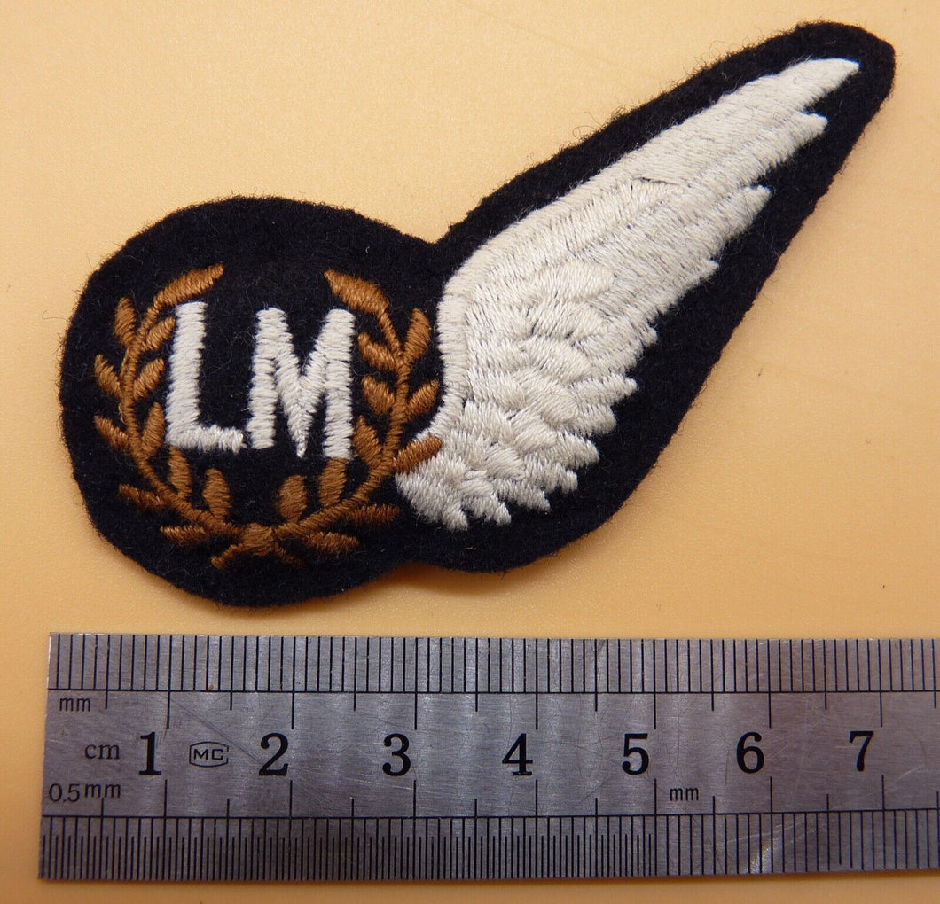 A British RAF Royal Air Force Load Master LM half wing - padded brevet badge.