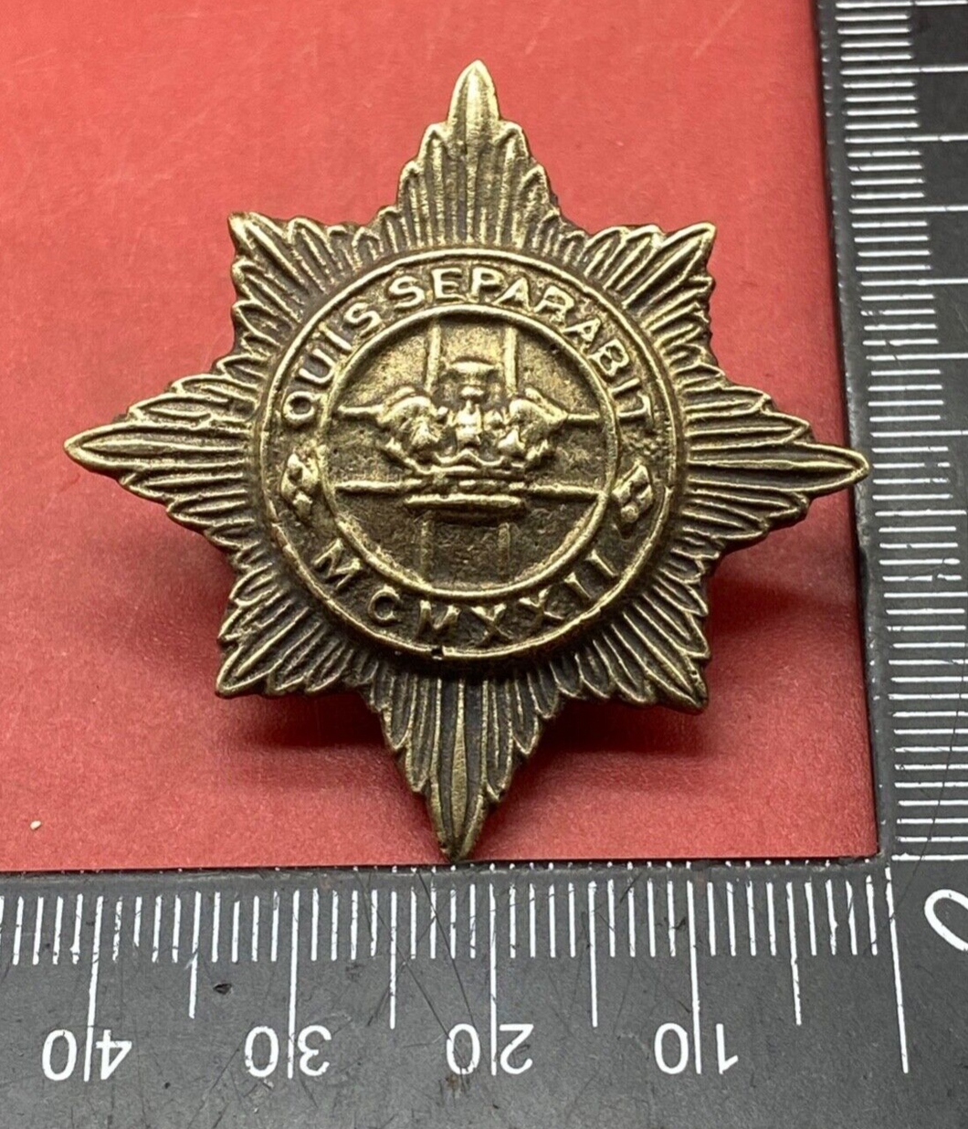 Original British Army 4th / 7th Dragoon Guards White Metal Cap Badge.