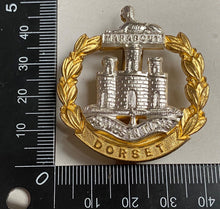 Load image into Gallery viewer, A British Army Dorset Regiment dress uniform badge white /gilt metal. - The Militaria Shop
