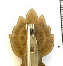 Load image into Gallery viewer, A WW2 Royal Artillery Association Benevolent Fund economy issue plastic badge

