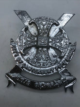 Load image into Gallery viewer, A white metal CITY OF CANTERBURY PIPE BAND cap badge - Factory Sample --- B53
