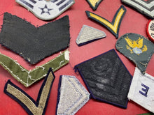 Load image into Gallery viewer, A Group of US Army Badges, Patches, Rank Chevrons etc. etc.

