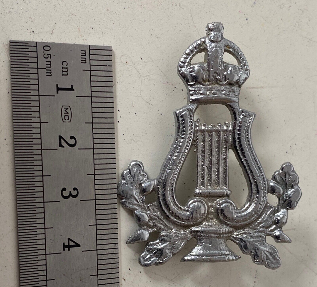 A Kings Crown British Army Musicians Badge locally sand cast in white metal. B61