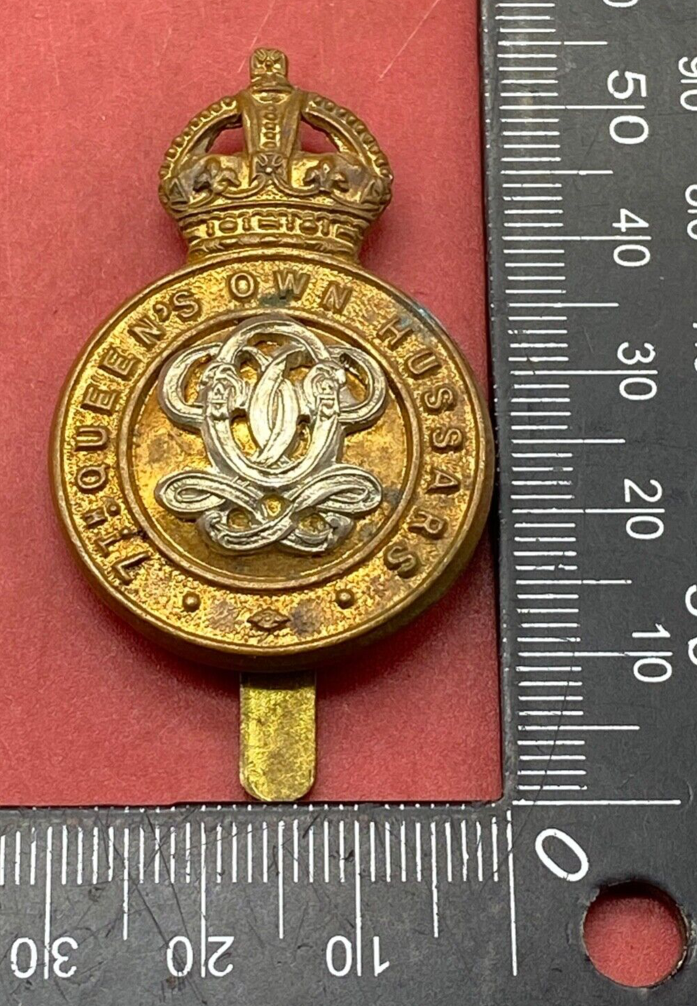 Original British Army 7th Army Queen's Own Hussar's Brass Cap Badge.