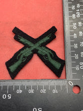 Load image into Gallery viewer, British Army Current Issue Gurkha Regiment Subdued Crossed Rifles Trade Badge.
