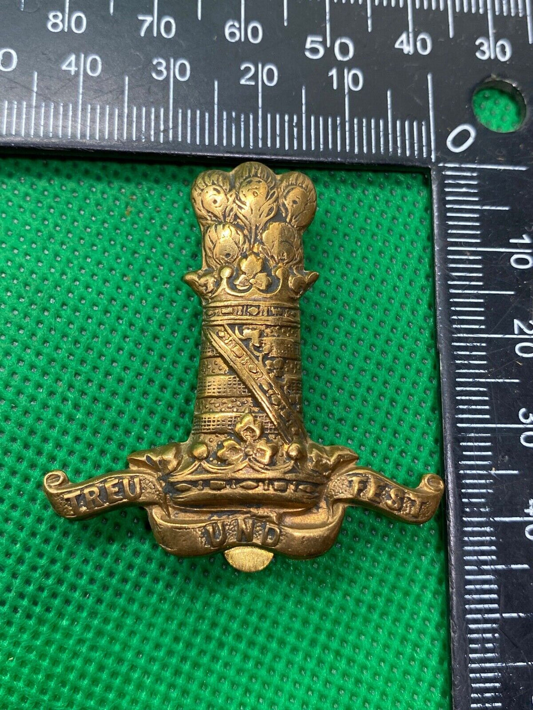 British Army - 11th Hussars Regiment Cap Badge. Maker Marked on the Slider