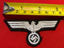 Load image into Gallery viewer, WW2 German Army Enlisted Man&#39;s Breast Eagle - Panzer reproduction on a black background.
