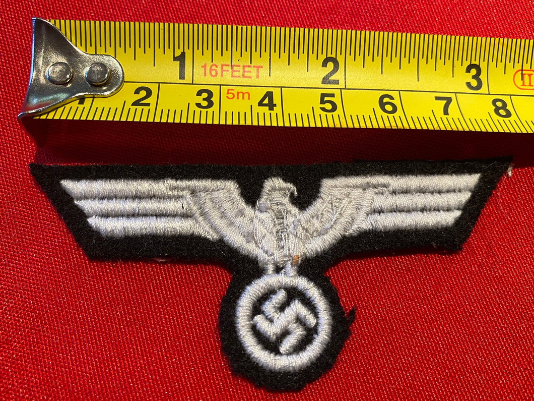 WW2 German Army Enlisted Man's Breast Eagle - Panzer reproduction on a black background.